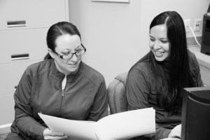 Office staff talking with each other